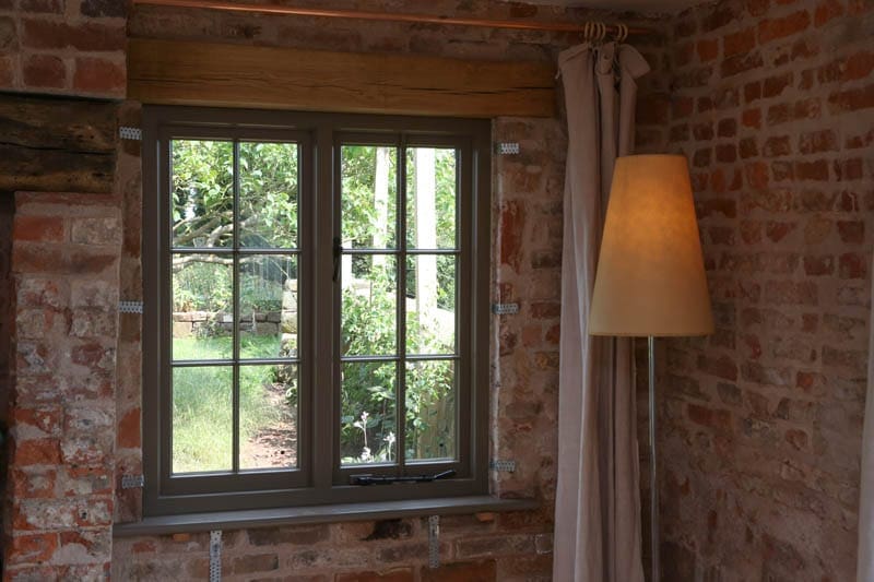 Heritage Casement windows in Warwickshire - interior shot of vacuum glazing in 2 casement windows after replacement with LandVac heritage vacuum glazing