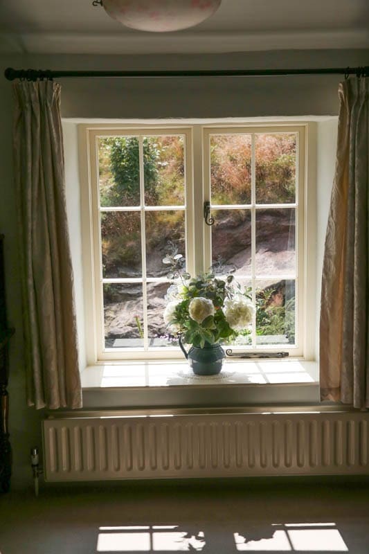 Interior view of a heritage window with Georgian window bars in Quarry Cottage, Belper