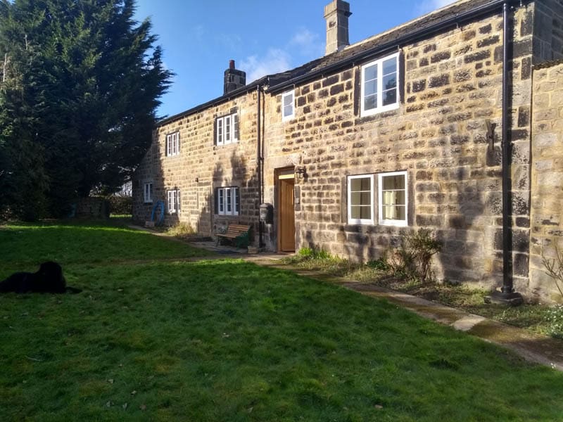 Wide shot of heritage casement windows with vacuum glazing units in a listed farmhouse in Leeds