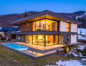 Energy-Efficient Windows in Czechia - A modern Czech home with large, sleek energy-efficient windows. The house is set in a 674146